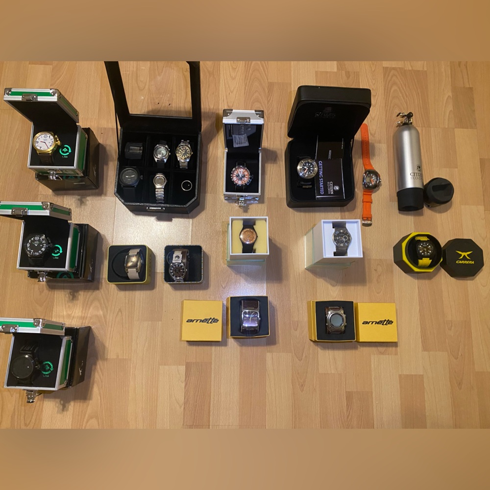 Watches - Various Brands and Designers. An assortment of styles and colors.